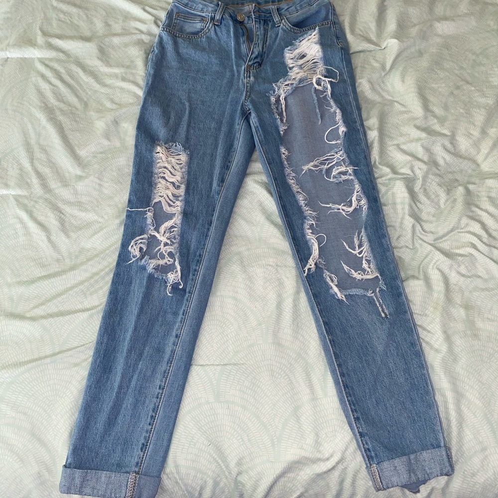 Light Blue Ripped Jeans.